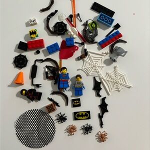 Legos, Superman, Batman, various Batman and Spider man parts.